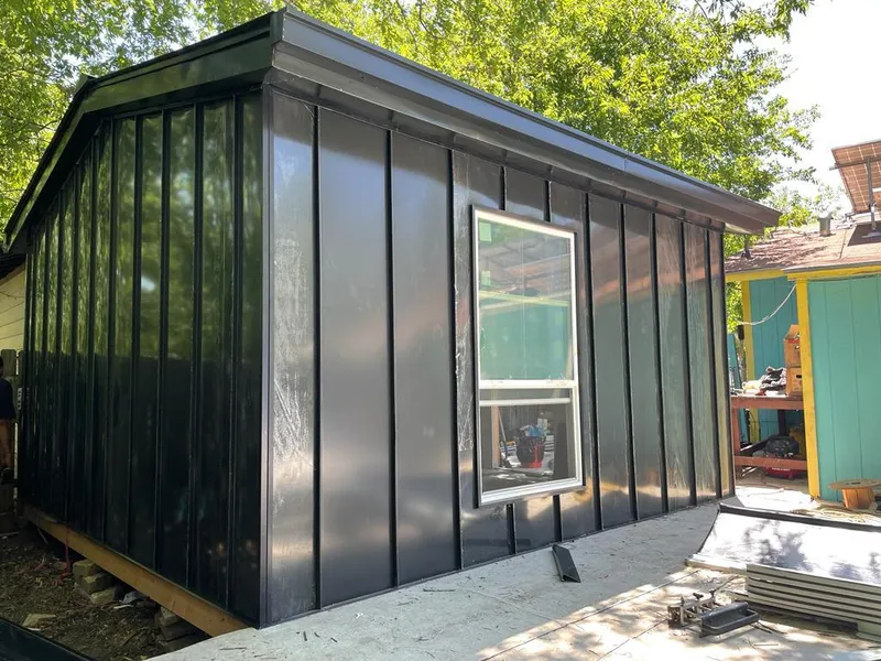 Black standing seam metal wall panels for Metal Roof Installation in Applewood