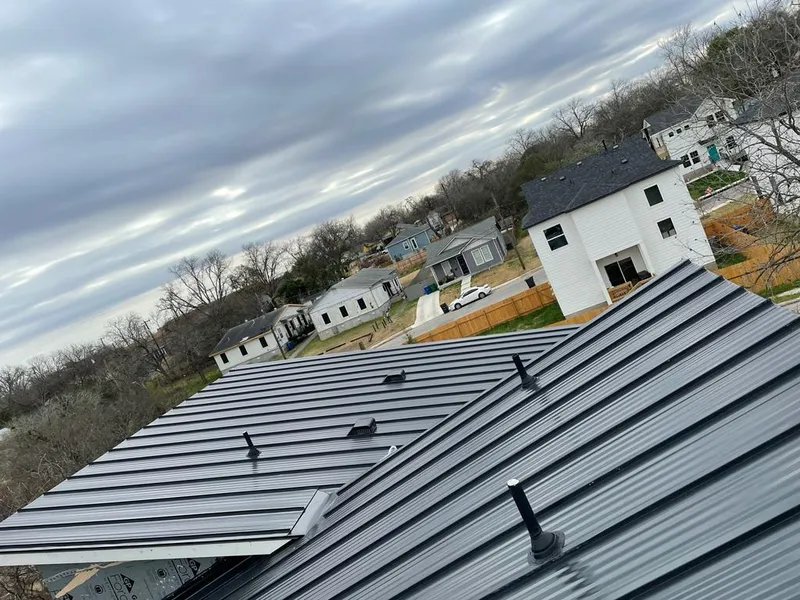 Standing seam metal roof panels with vents for Skylight Repair in Applewood
